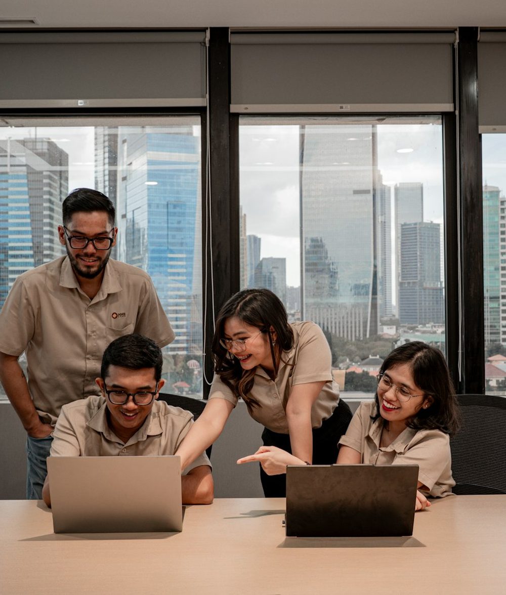 A team working together on laptops